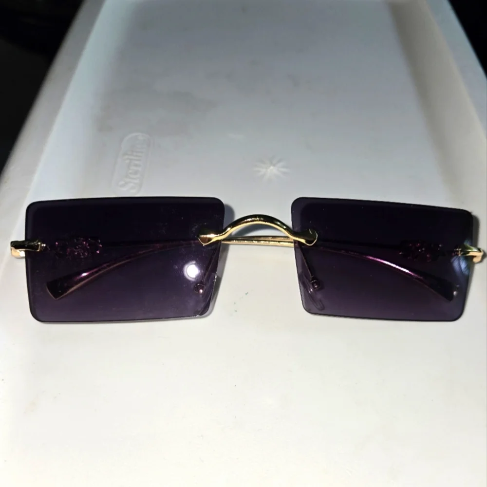 Gold and Purple Rimless Sunglasses